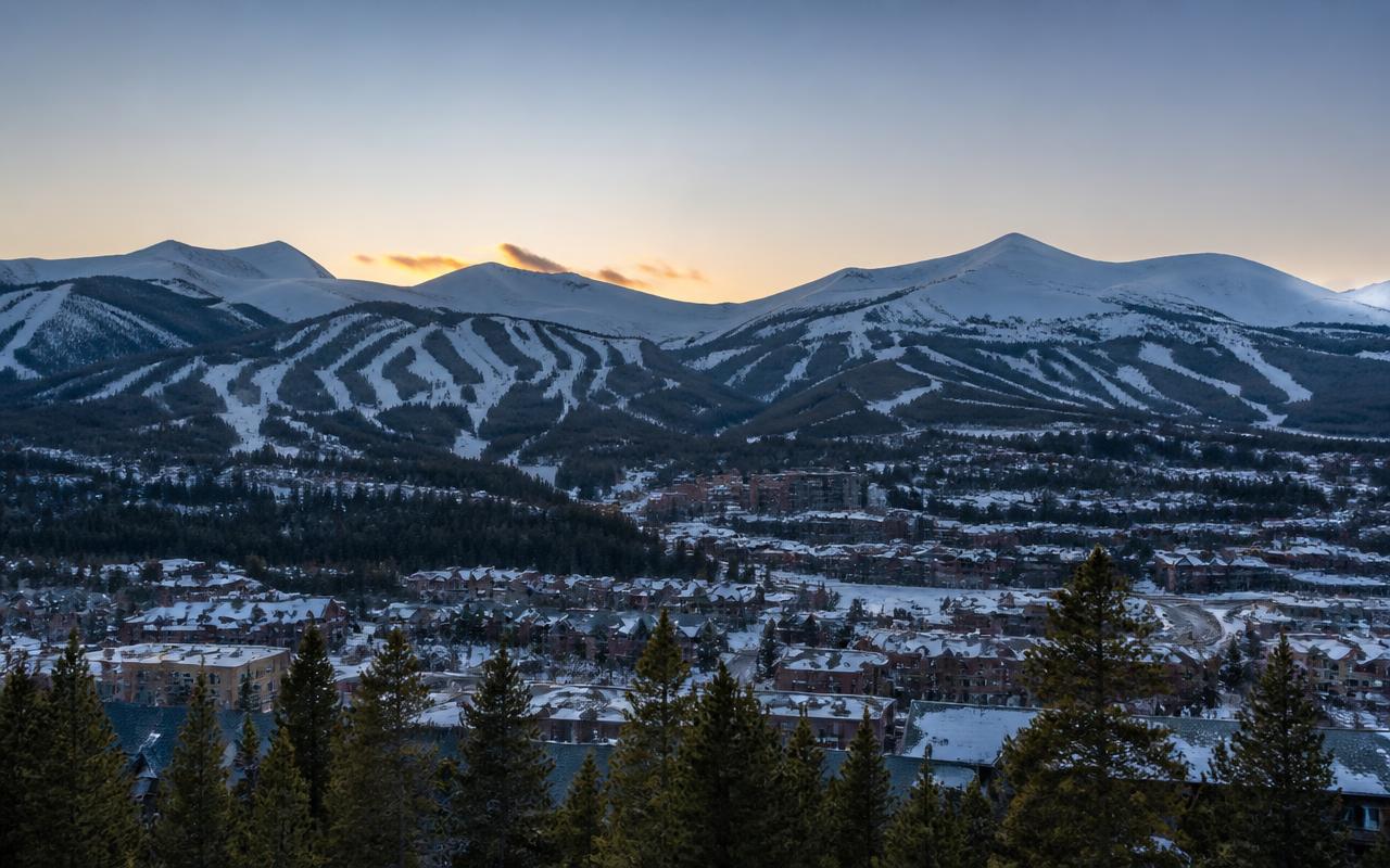Snow-covered Rocky Mountain town at dawn near Breckenridge, Colorado